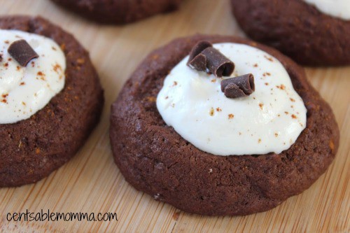 You'll be thinking about sitting down with a nice cup of hot chocolate on a cold winter day with each bite of these Hot Chocolate Thumbprint cookies - with hints of cocoa and vanilla.