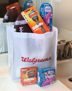 Walgreens bag with Gillette and Venus shave products.